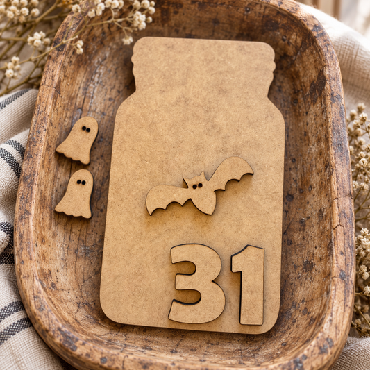 Unfinished MDF Canning Jar with bat and ghosts DIY wood kit pieces in a rustic wooden tray