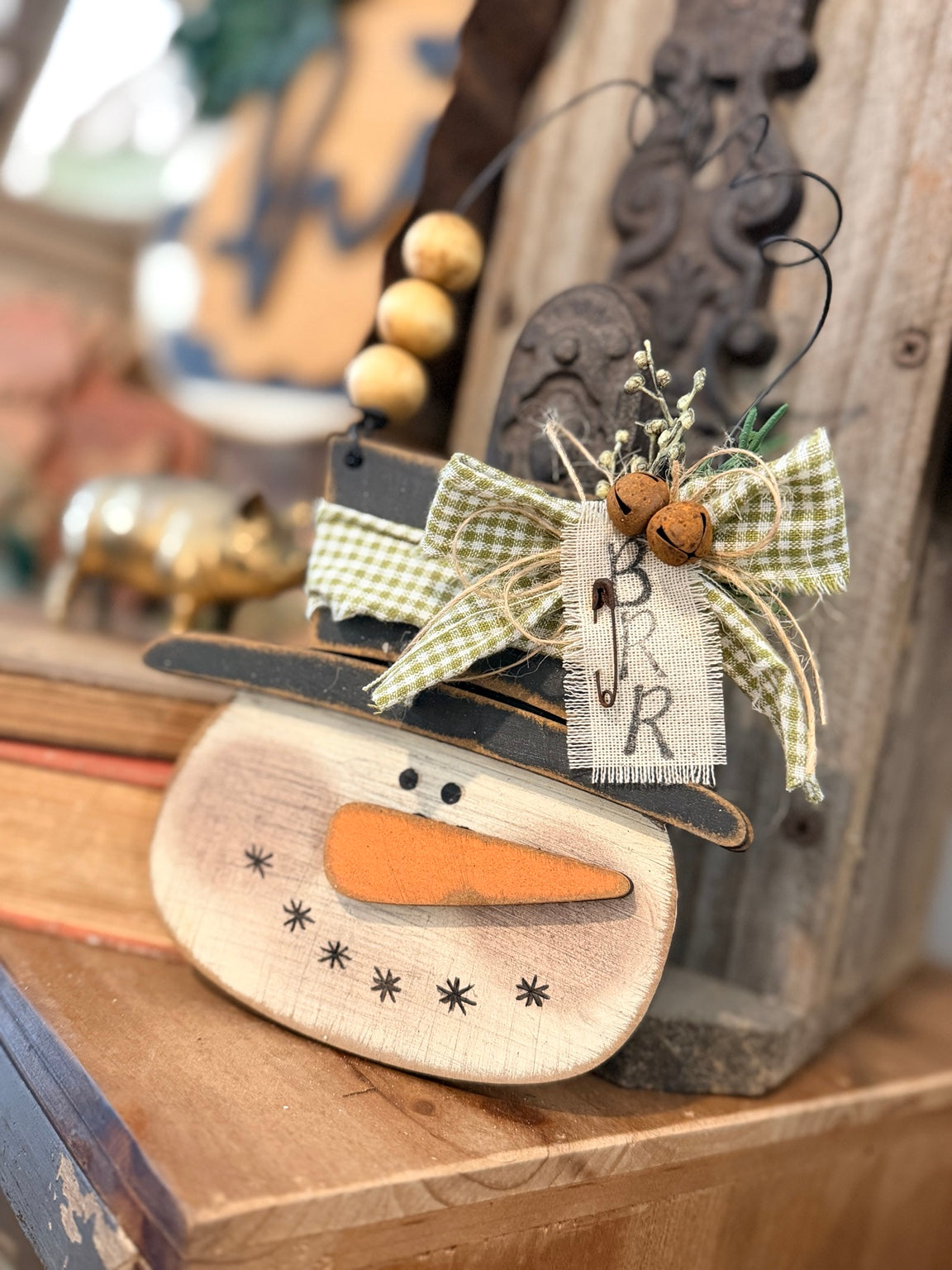 Primitive Frosty Snowman ornament with black top hat and olive gingham bow