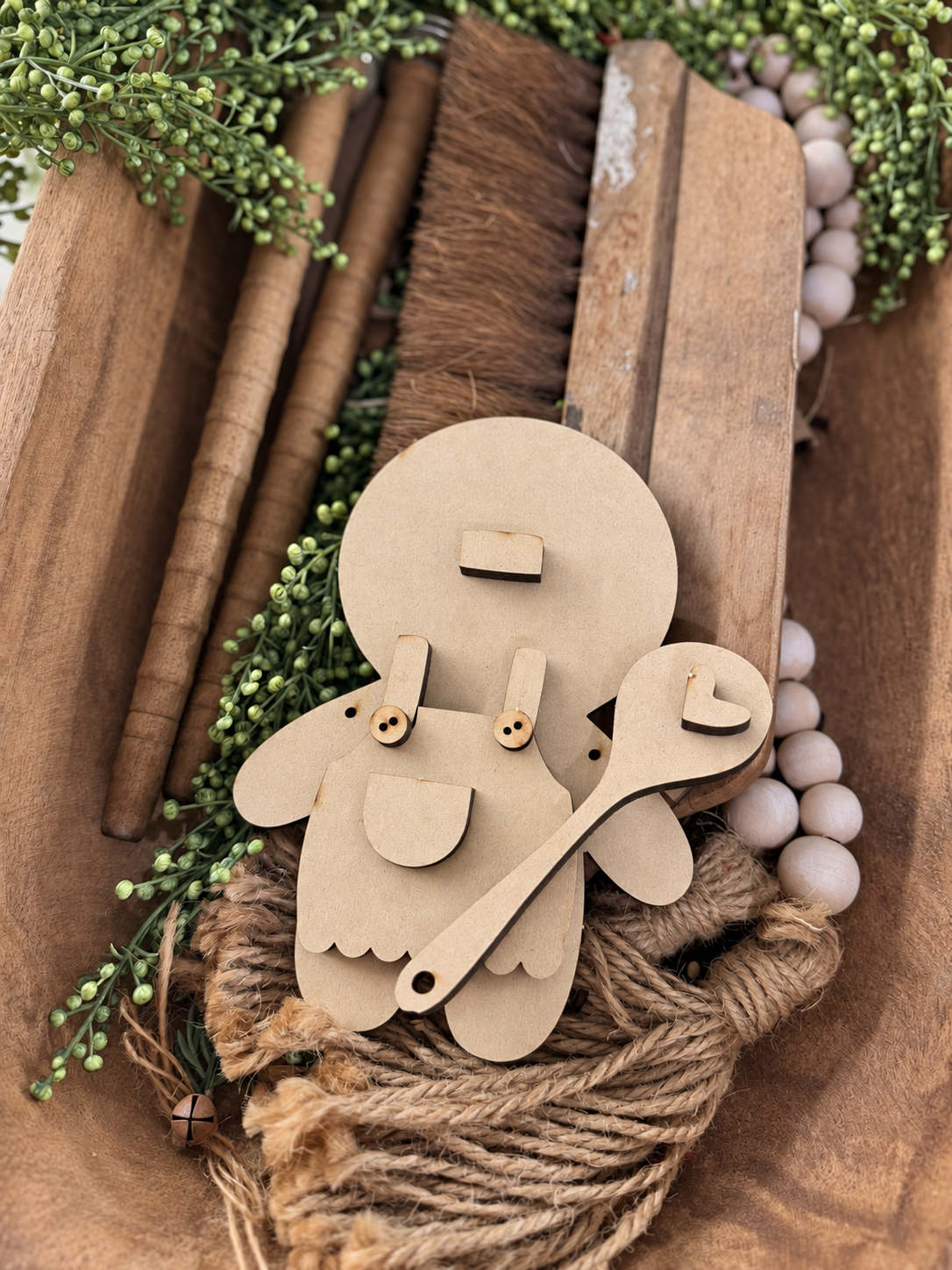 Unpainted Wonky Gingerbread Baker Girl ornament with apron and heart spoon